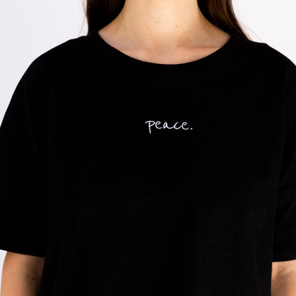 Good-Natured Peace-Frauenshirt schwarz
|| Sina ist 1,60m groß, schlank gebaut und trägt eine S.