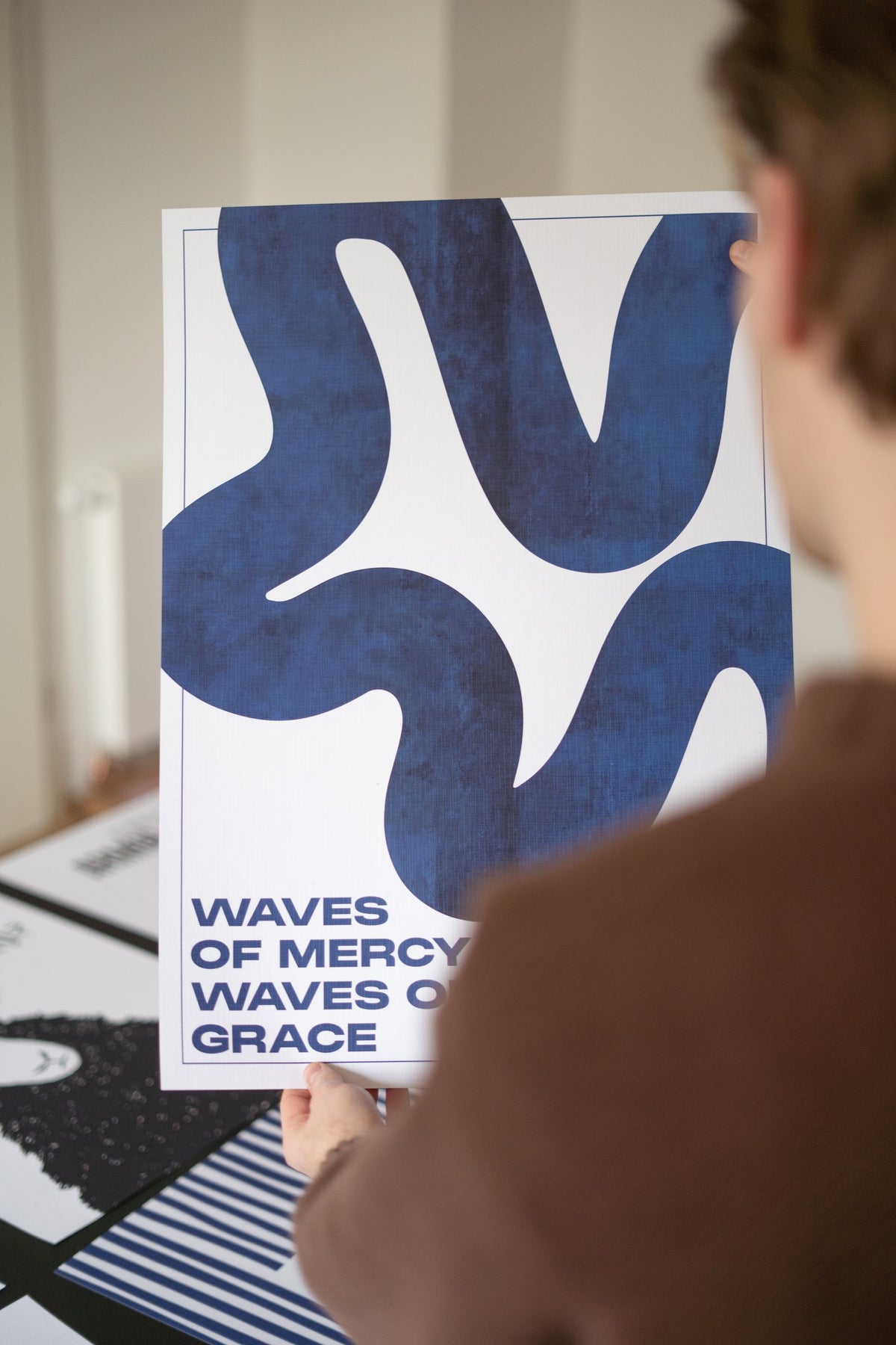 Waves of Mercy Poster von Good-Natured in der Hand